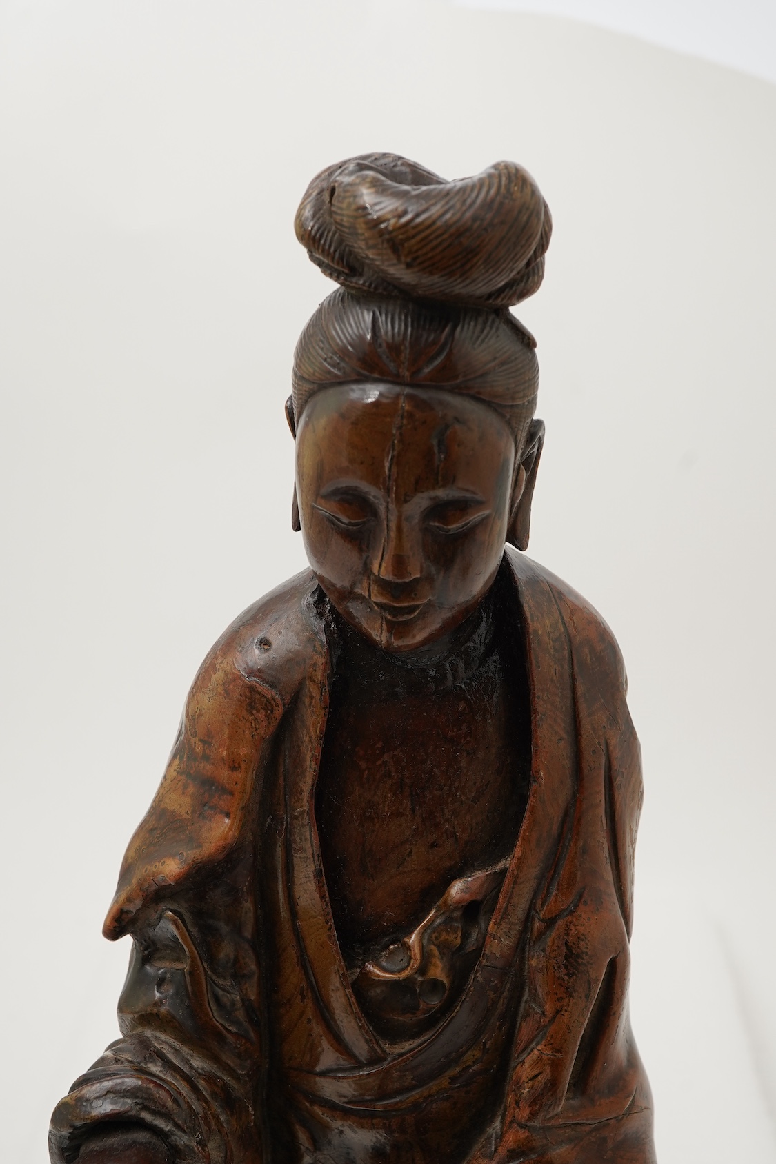 A Chinese rootwood standing figure of Guanyin, 18th/19th century
